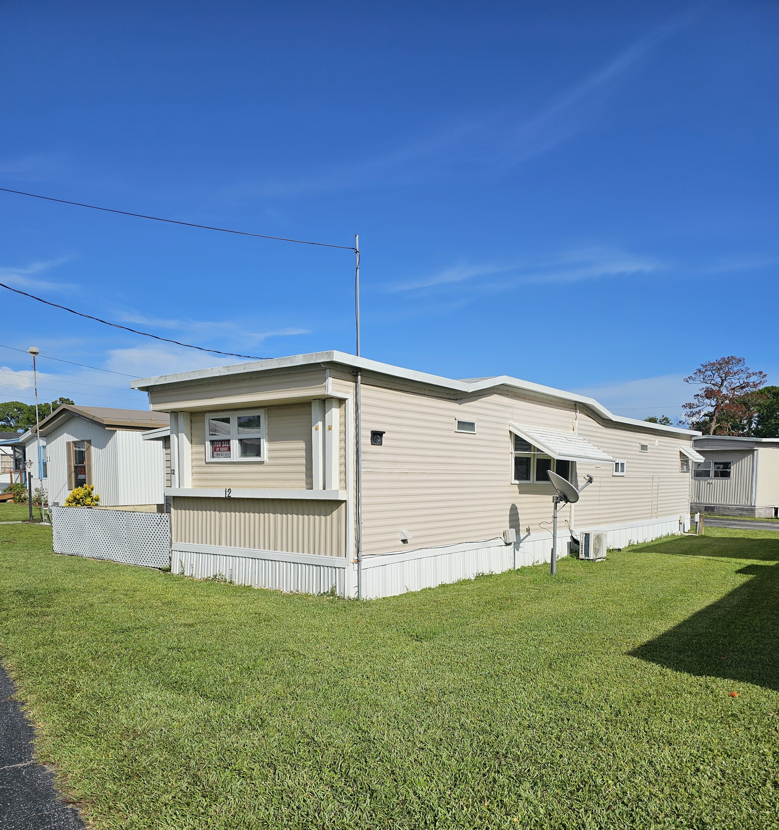 2450 S Ridgewood Avenue, Lot 12, Edgewater, Florida 32141, 2 Bedrooms Bedrooms, ,1.5 BathroomsBathrooms,55-Plus Mobile Home,For Sale,S Ridgewood Avenue, Lot 12,3972